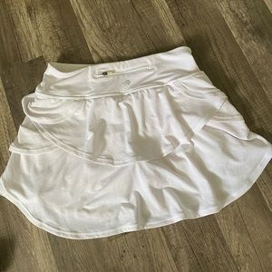 Ideology white tennis skirt has back pocket with zipper